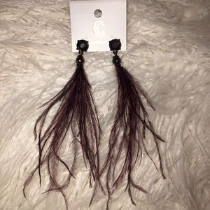 Purple feather earrings